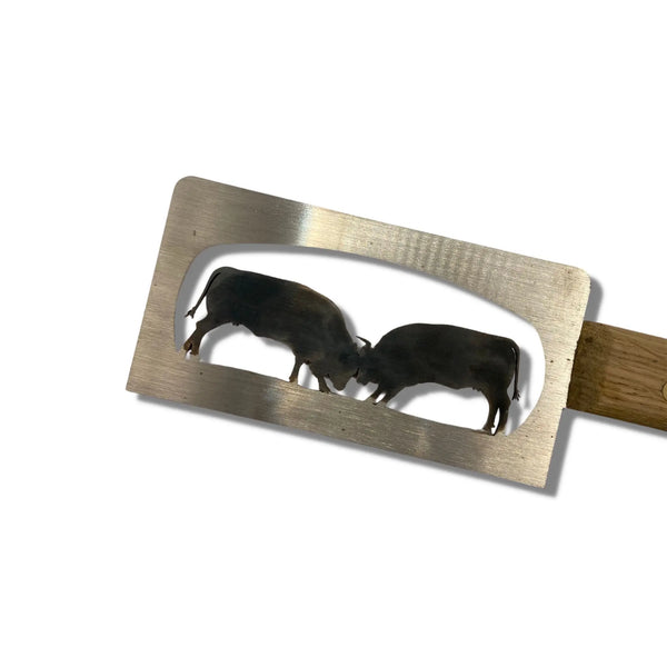 Cow drawing raclette knife