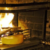 Plaque refroidissante à eau pour raclette au feu de bois